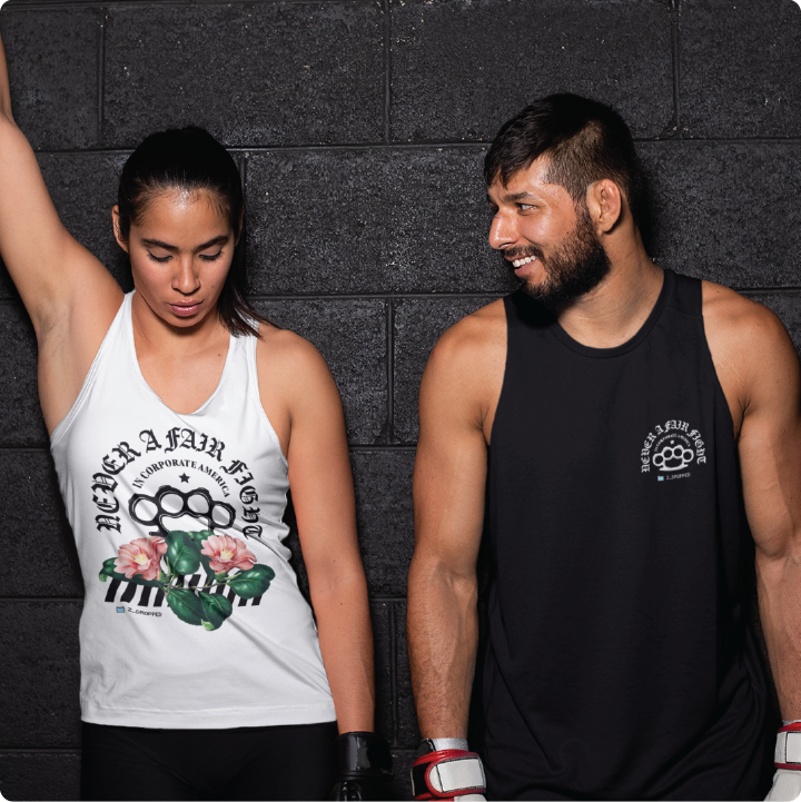 mma fighters looking down at their white and black zdropped tank top designed by chi hom. t shirt graphic says Never a Fair fight in corporate America with a picture of brass knuckles and pink flowers