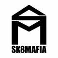 Logo with stylized letters S and M inside a geometric shape, resembling a house. Below, it says SK8MAFIA in bold lettering.